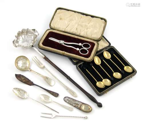 A mixed lot of silver flatware, various dates and makers, comprising: a George II punch ladle,