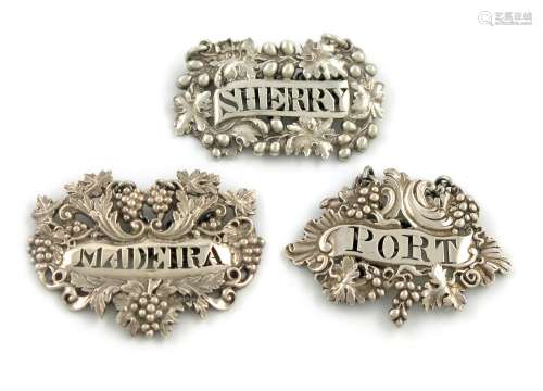 A collection of three 19th century cast silver wine labels, various makers, London 1833, 1853 and