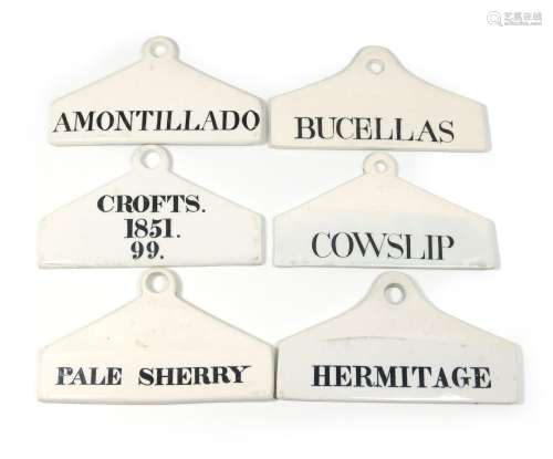 A collection of six early 19th century ceramic bin labels, some by Wedgwood, Minton and Farrow and