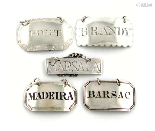 A collection of five antique silver wine labels, various dates and makers, broad and narrow
