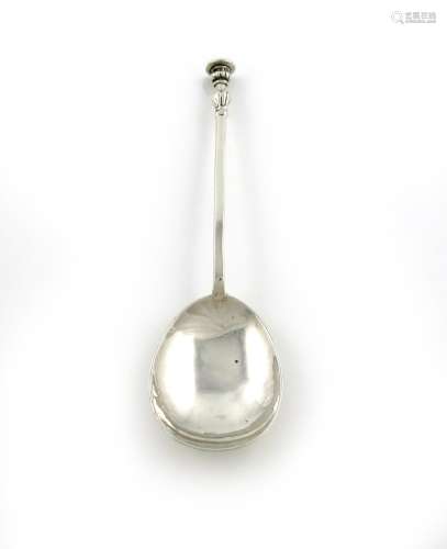 An Arts and Crafts silver Seal-top spoon, maker's mark of F.H, London 1935, spot-hammered bowl,