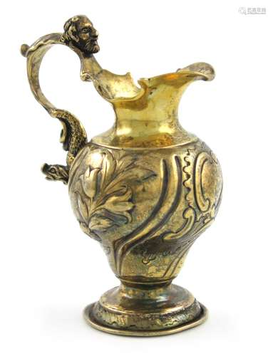 A Victorian silver-gilt cream jug, by George Frederick Pinnell, London 1838, in the 18th century