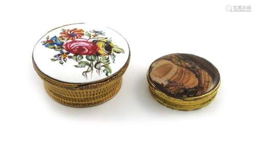 An 18th century gilt metal and agate snuff box, unmarked, circular form, the mount with chased