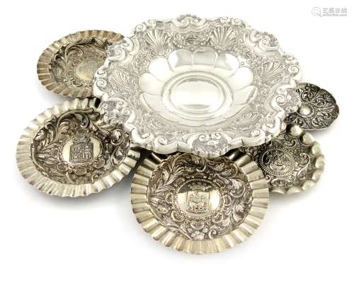 A mixed lot of Portuguese silver items, various dates, comprising: a dish of circular form, embossed