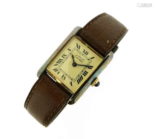 CARTIER - a lady's silver-gilt Must de Cartier tank wristwatch, signed enamel dial with black