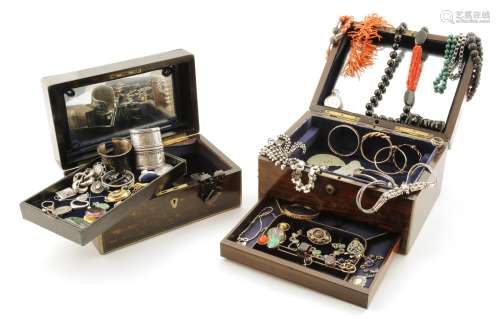 Two jewellery caskets containing an assortment of jewellery including a lapis lazui cabochon mounted