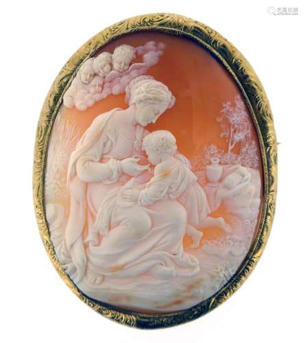 A Victorian shell cameo brooch, depicting a woman and child in the classical manner surrounded by