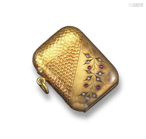 A 19th century gold vesta case, with honeycombe decoration, and set with rubies and diamonds, hinged