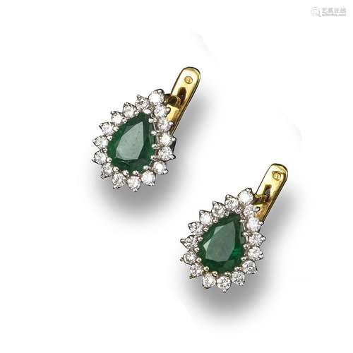 A pair of emerald and diamond cluster earrings, the pear-shaped emeralds set within a surround of