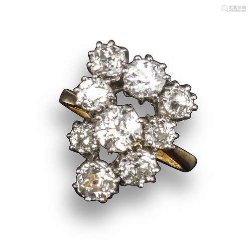 A diamond cluster ring, the graduated old circular-cut diamonds weigh approximately 2.60cts in