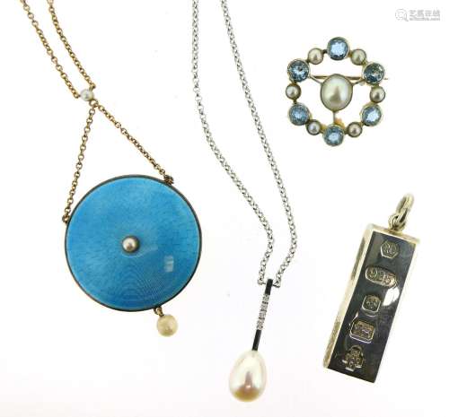 An Edwardian circular guilloche blue enamel pendant, set with pearls on fine-link neck chain, a
