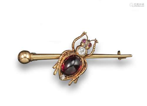 An early 20th century insect brooch, the yellow gold beetle set with diamonds and cabochon garnets