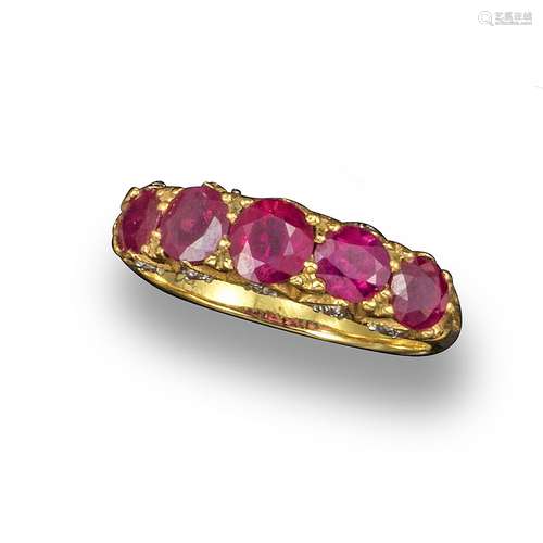 A ruby five stone ring, set with graduated circular-cut rubies and diamonds set to the gallery in