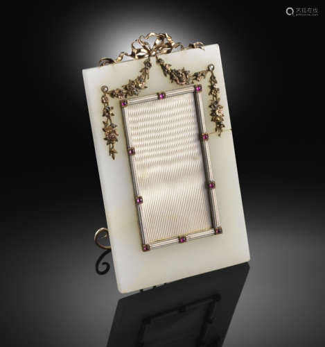 A hardstone frame by Fabergé, workmaster Karl Armfelt, the rectangular chalcedony frame (damaged)