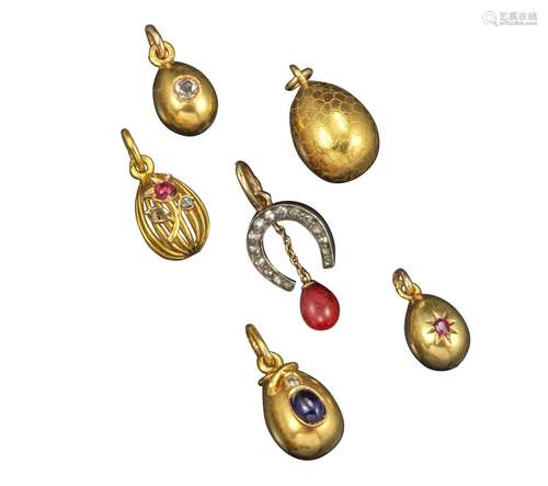 Five Russian gold miniature egg pendants, a pendant with pricked vermicelli pattern, the pendant