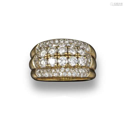 A diamond half-hoop ring, set with four lines of graduated circular-cut diamonds in yellow gold,
