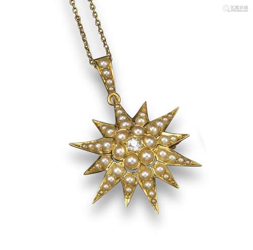 A late 19th century pearl and diamond star pendant, set overall with graduated seed pearls and a