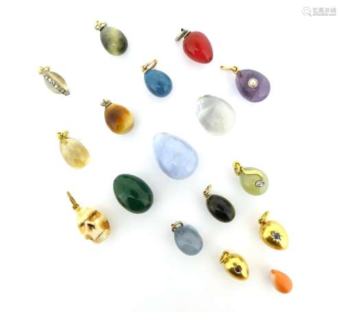 Seventeen assorted miniature egg-form pendants, four drilled but missing bales, the stylised