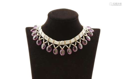 A seed pearl and amethyst fringe collar, the four rows of seed pearls are separated with yellow gold