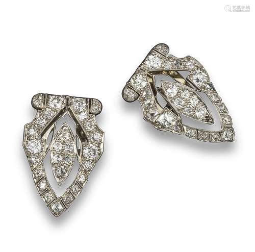 A pair of Art Deco onyx and diamond double clips, of symmetrical design and millegrain-set overall