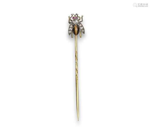 A late 19th century bee stick pin, set with rose-cut diamonds and with a tiger's eye body and ruby