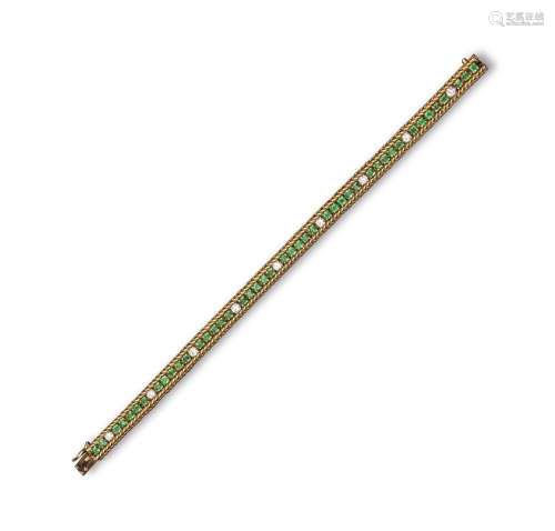 A French emerald and diamond bracelet, set with a central line of emeralds and diamonds within