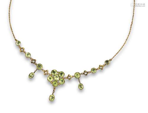 A peridot necklace by Murrle Bennett & Co, the central cluster of six circular-cut peridots are