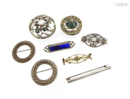 Seven silver brooches by H.G. Murphy, including two circular brooches with ropetwist and oval-link