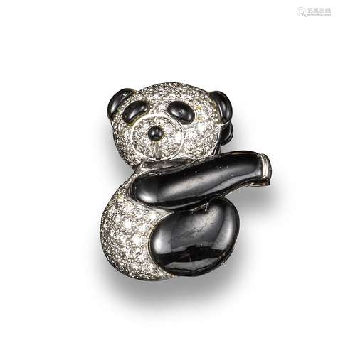 A black onyx and diamond panda brooch, the stylised panda pave-set with circular-cut diamonds and