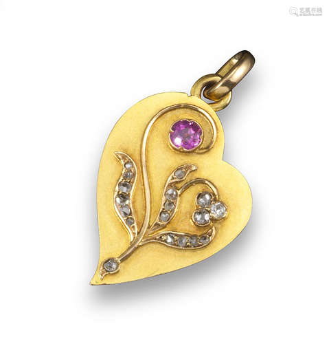 An early 20th century Russian yellow gold stylised heart-shaped hinged locket pendant, applied