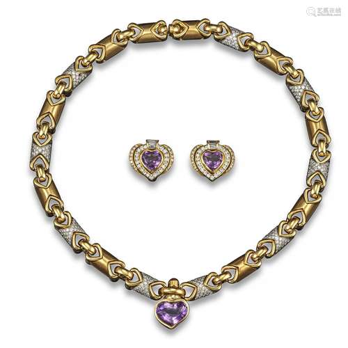 An amethyst and diamond gold necklace with matching earrings, the yellow gold necklace with heart-