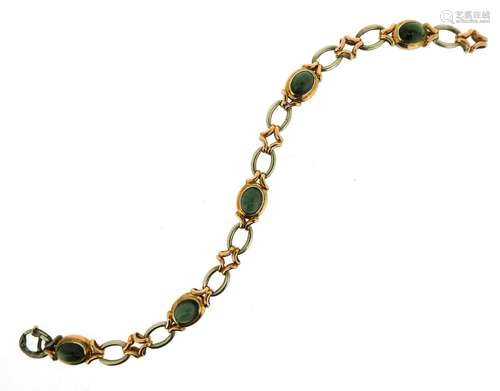 A green tourmaline bracelet, on white and yellow fancy-link bracelet, 19cm long