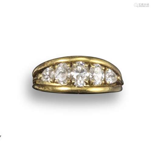 A five-stone diamond ring, set with five graduated oval-shaped diamonds within yellow gold border on