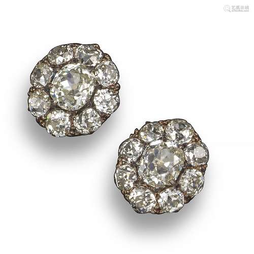 A pair of antique diamond cluster earrings, set with a central cushion-shaped diamond within a