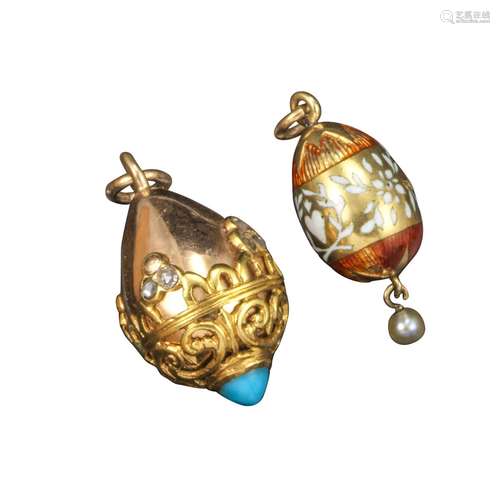 Two early 20th century Russian miniature egg pendants, a pink gold pendant with scroll pierced