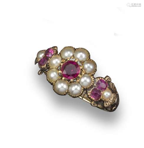 A Victorian ruby and seed pearl cluster ring, the circular-cut ruby is set within a surround of seed