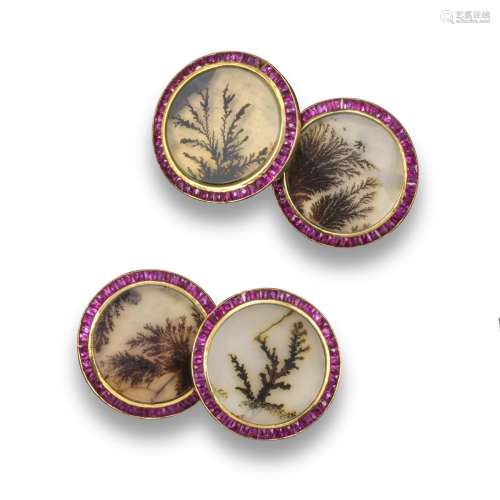 A pair of moss agate and ruby cufflinks, each circular panel of moss agate is set within a border of