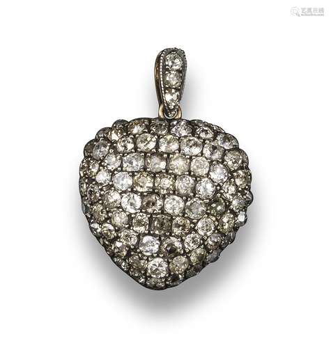 A diamond-set heart-shaped pendant, the gold heart pave-set with small diamonds, detachable heart-