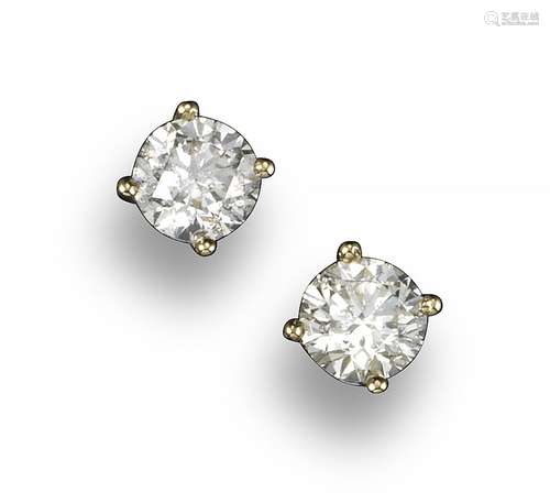 A pair of diamond stud earrings, the round brilliant-cut diamonds weigh approximately 1.95cts in