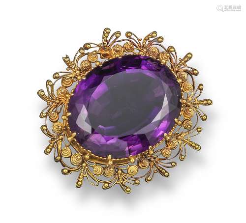 A Regency gold-mounted amethyst brooch, the oval-shaped rich colour amethyst is set in a gold