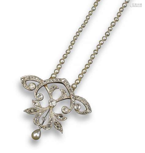 An Art Nouveau diamond-set pendant, set in platinum and gold with old circular and rose-cut diamonds