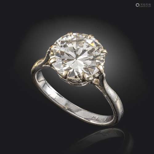 A diamond solitaire ring, the old circular-cut diamond weighs approximately 3.15cts and is set in