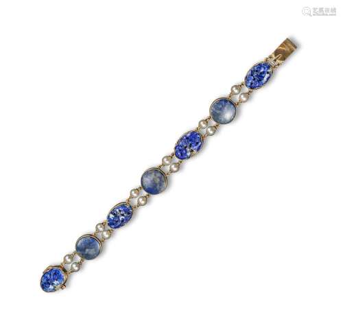 A lapis lazuli, cultured pearl and yellow gold bracelet, alternately-mounted with plain circular and