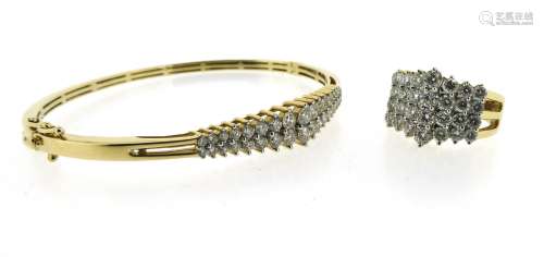 A yellow gold hinge bangle, set with two lines of graduated round brilliant-cut diamonds, cased,