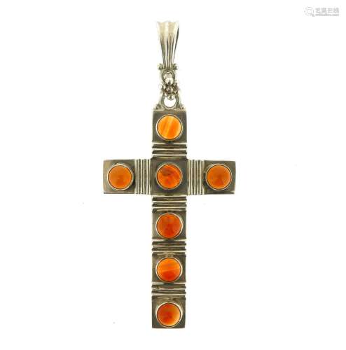 A silver cross pendant by H.G. Murphy, set with carnelian cabochons and linear decoration in silver,