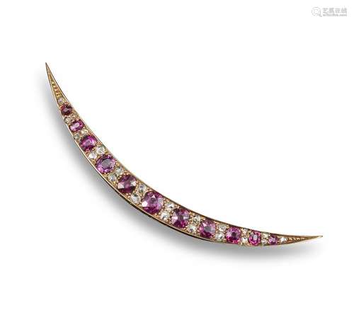 A Victorian ruby and diamond open crescent brooch, set with graduated oval-shaped rubies separated