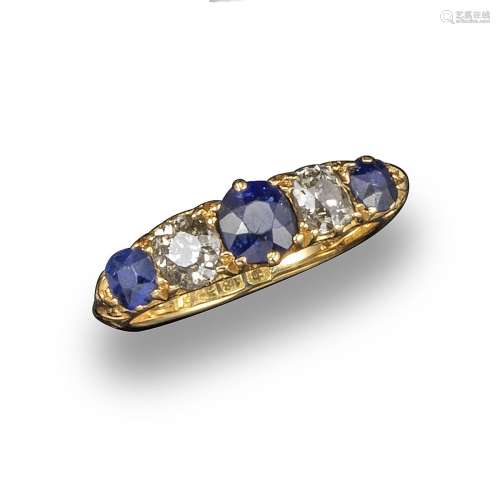 A sapphire and diamond five-stone ring, set with three sapphires and two old circular-cut diamonds