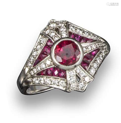 An Edwardian-style ruby and diamond-set ring, centred with a circular-cut ruby within diamond-set