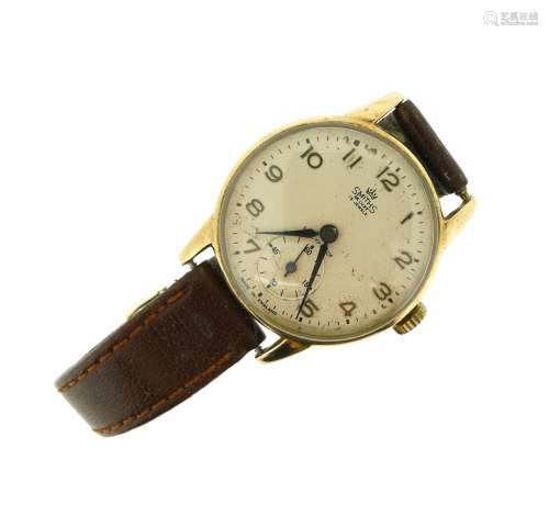 SMITHS - a gentleman's 9ct gold De-Luxe wrist watch, cream dial with Arabic numeral hour markers,