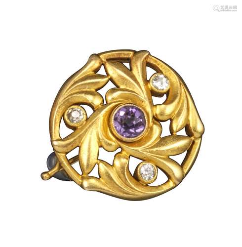 A Russian Art Nouveau circular gold brooch, with foliate pierced decoration centred with a